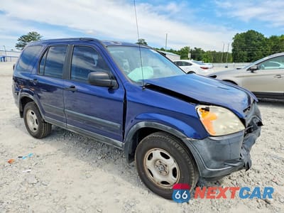 Czwarte zdjęcie samochodu z boku: 2002 HONDA CR-V LX VIN:JHLRD68402C003443 - miniatura