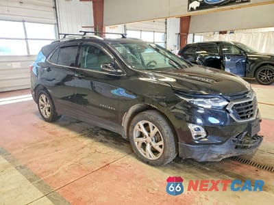 Czwarte zdjęcie samochodu z boku: 2019 CHEVROLET EQUINOX LT VIN:2GNAXVEX9K6154565 - miniatura