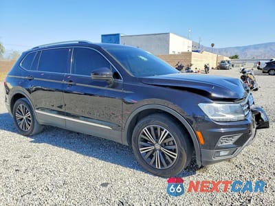 Czwarte zdjęcie samochodu z boku: 2019 VOLKSWAGEN TIGUAN SE VIN:3VV3B7AX5KM061373 - miniatura
