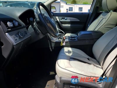 Zdjęcie 7 z 13 samochodu: 2014 LINCOLN MKX VIN:2LMDJ6JK8EBL14857 - miniatura