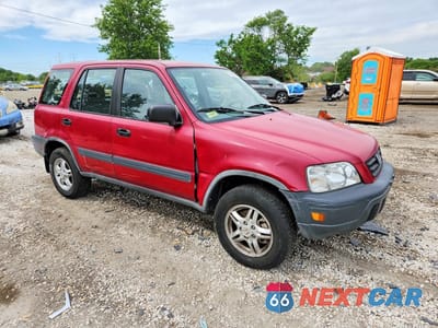 Czwarte zdjęcie samochodu z boku: 1997 HONDA CR-V LX VIN:JHLRD1853VC021001 - miniatura