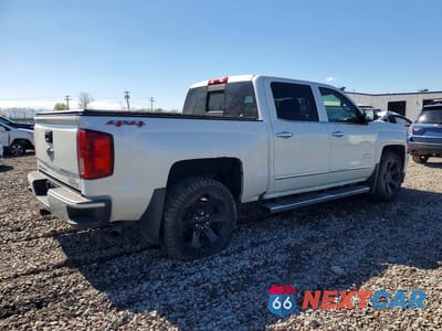 Trzecie zdjęcie samochodu z tyłu: 2017 CHEVROLET SILVERADO K1500 HIGH COUNTRY VIN:3GCUKTEJXHG204973 - miniatura