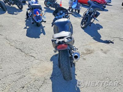 Czwarte zdjęcie samochodu z boku: 2004 YAMAHA YZF600 R VIN:JYA5AHC014A042783 - miniatura