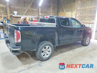 Trzecie zdjęcie samochodu z tyłu: 2016 GMC CANYON SLE VIN:1GTG5CE36G1199080 - miniatura