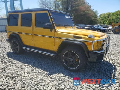 Czwarte zdjęcie samochodu z boku: 2003 MERCEDES-BENZ G 55 AMG VIN:WDCYR46E03X140865 - miniatura