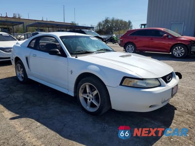 Czwarte zdjęcie samochodu z boku: 2000 FORD MUSTANG VIN:1FAFP4045YF221107 - miniatura
