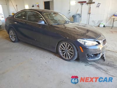 Czwarte zdjęcie samochodu z boku: 2014 BMW 228 I VIN:WBA1F5C50EVV99044 - miniatura