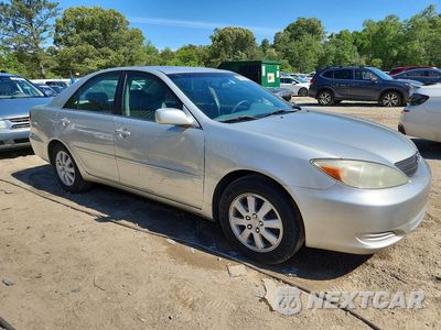 Czwarte zdjęcie samochodu z boku: 2002 TOYOTA CAMRY XLE V6 VIN:4T1BF32K52U024521 - miniatura