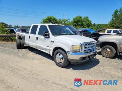 Czwarte zdjęcie samochodu z boku: 2002 FORD F350 SUPER DUTY VIN:1FTWW32F22EA16668 - miniatura