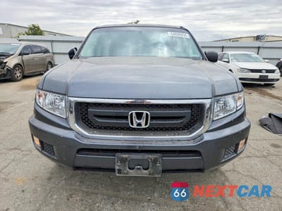 Piąte zdjęcie samochodu w środku: 2010 HONDA RIDGELINE RT VIN:5FPYK1F2XAB010802 - miniatura