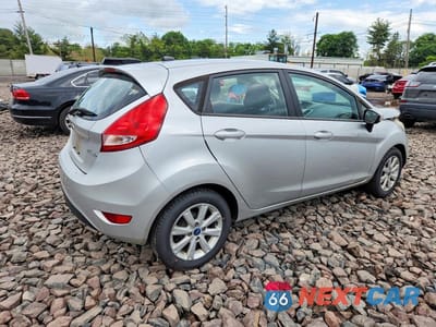 Trzecie zdjęcie samochodu z tyłu: 2013 FORD FIESTA SE VIN:3FADP4EJ8DM150405 - miniatura
