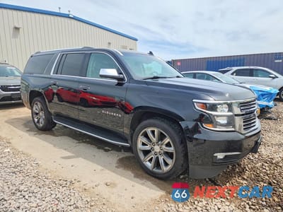 Czwarte zdjęcie samochodu z boku: 2018 CHEVROLET SUBURBAN K1500 PREMIER VIN:1GNSKJKC1JR151613 - miniatura