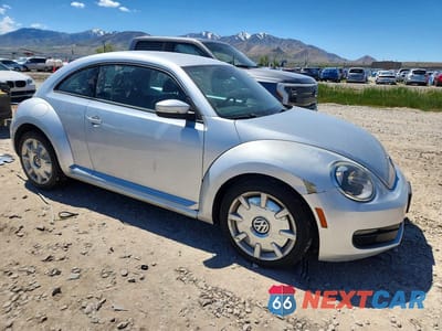 Czwarte zdjęcie samochodu z boku: 2012 VOLKSWAGEN BEETLE VIN:3VWJP7AT3CM601922 - miniatura