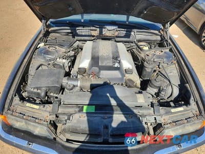 Zdjęcie 11 z 12 samochodu: 2000 BMW 740 IL VIN:WBAGH8342YDP11785 - miniatura