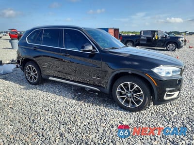 Czwarte zdjęcie samochodu z boku: 2018 BMW X5 SDRIVE35I VIN:5UXKR2C58J0Z18984 - miniatura