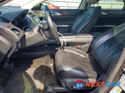 Zdjęcie 7 z 12 samochodu: 2016 LINCOLN MKZ HYBRID VIN:3LN6L2LU2GR634041 - miniatura