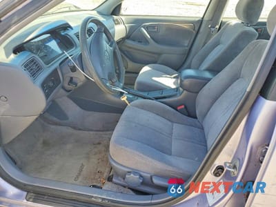 Zdjęcie 7 z 12 samochodu: 1997 TOYOTA CAMRY LE VIN:JT2BG22KXV0055134 - miniatura