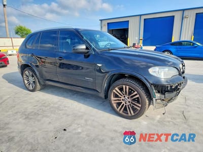 Czwarte zdjęcie samochodu z boku: 2013 BMW X5 XDRIVE35I VIN:5UXZV4C59D0B06980 - miniatura