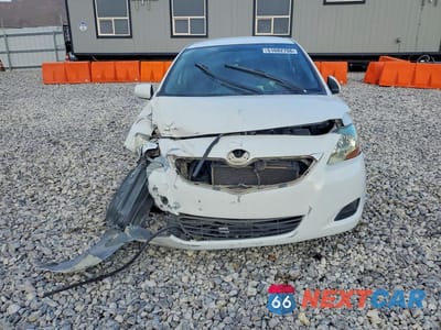 Piąte zdjęcie samochodu w środku: 2009 TOYOTA YARIS BASE VIN:JTDBT903494049691 - miniatura
