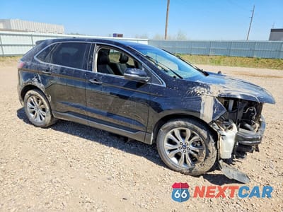 Czwarte zdjęcie samochodu z boku: 2019 FORD EDGE TITANIUM VIN:2FMPK4K93KBC22797 - miniatura