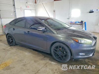 Czwarte zdjęcie samochodu z boku: 2016 FORD FOCUS SE VIN:1FADP3F2XGL406793 - miniatura
