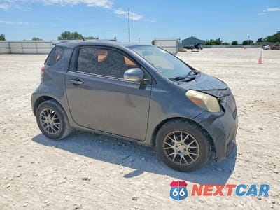 Czwarte zdjęcie samochodu z boku: 2012 SCION IQ BASE VIN:JTNJJXB05CJ019094 - miniatura