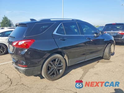 Trzecie zdjęcie samochodu z tyłu: 2020 CHEVROLET EQUINOX LT VIN:2GNAXVEX2L6122784 - miniatura