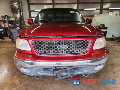 Piąte zdjęcie samochodu w środku: 2001 FORD F150 VIN:1FTRX18L11NB36620 - miniatura