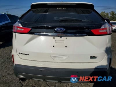Zdjęcie 6 z 13 samochodu: 2020 FORD EDGE SEL VIN:2FMPK3J94LBA19754 - miniatura