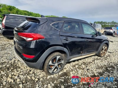 Trzecie zdjęcie samochodu z tyłu: 2018 HYUNDAI TUCSON LIMITED VIN:KM8J3CA24JU799333 - miniatura