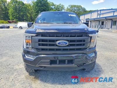 Piąte zdjęcie samochodu w środku: 2021 FORD F150 SUPERCREW VIN:1FTFW1ED5MFB43412 - miniatura