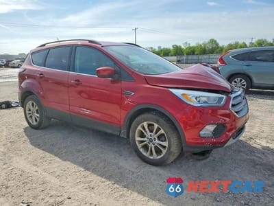 Czwarte zdjęcie samochodu z boku: 2018 FORD ESCAPE SEL VIN:1FMCU9HDXJUA95573 - miniatura
