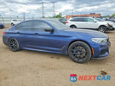 Czwarte zdjęcie samochodu z boku: 2019 BMW M550XI VIN:WBAJB9C54KB464312 - miniatura