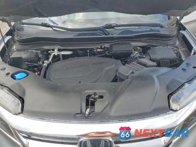 Zdjęcie 12 z 13 samochodu: 2021 HONDA PILOT EX VIN:5FNYF5H36MB011847 - miniatura