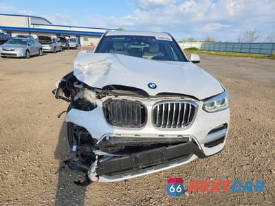 Piąte zdjęcie samochodu w środku: 2021 BMW X3 XDRIVE30E VIN:5UXTS1C06M9G72429 - miniatura
