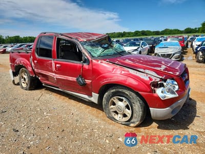 Czwarte zdjęcie samochodu z boku: 2003 FORD EXPLORER SPORT TRAC VIN:1FMZU67E83UB98514 - miniatura