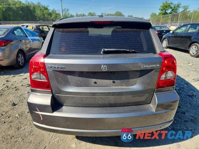 Zdjęcie 6 z 13 samochodu: 2011 DODGE CALIBER MAINSTREET VIN:1B3CB3HA3BD238072 - miniatura