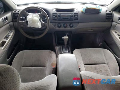 Zdjęcie 8 z 12 samochodu: 2003 TOYOTA CAMRY LE VIN:4T1BE32K13U226566 - miniatura
