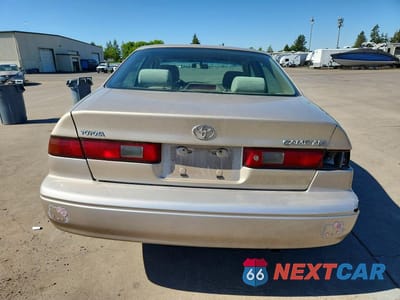 Zdjęcie 6 z 12 samochodu: 1999 TOYOTA CAMRY LE VIN:JT2BG22K3X0360400 - miniatura