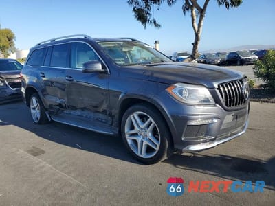Czwarte zdjęcie samochodu z boku: 2013 MERCEDES-BENZ GL 550 4MATIC VIN:4JGDF7DE3DA128081 - miniatura