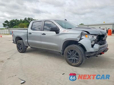 Czwarte zdjęcie samochodu z boku: 2025 CHEVROLET SILVERADO K1500 LT TRAIL BOSS VIN:3GCUKFED5SG310184 - miniatura
