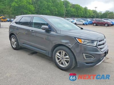 Czwarte zdjęcie samochodu z boku: 2018 FORD EDGE SEL VIN:2FMPK3J96JBC21024 - miniatura