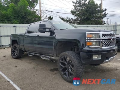 Czwarte zdjęcie samochodu z boku: 2014 CHEVROLET SILVERADO K1500 HIGH COUNTRY VIN:3GCUKTEC0EG351980 - miniatura