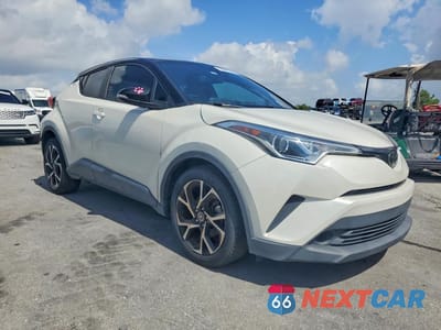 Czwarte zdjęcie samochodu z boku: 2019 TOYOTA C-HR XLE VIN:NMTKHMBX6KR091518 - miniatura