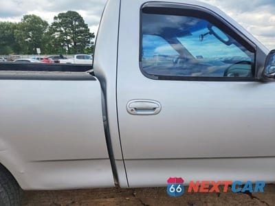 Zdjęcie 10 z 12 samochodu: 2002 FORD F150 VIN:1FTRF17202NB33138 - miniatura