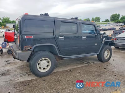 Trzecie zdjęcie samochodu z tyłu: 2004 HUMMER H2 VIN:5GRGN23U24H112847 - miniatura