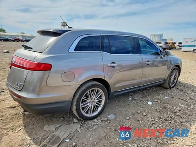 Trzecie zdjęcie samochodu z tyłu: 2015 LINCOLN MKT VIN:2LMHJ5AT1FBL03642 - miniatura