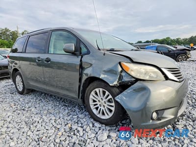 Czwarte zdjęcie samochodu z boku: 2014 TOYOTA SIENNA XLE 8-PASSENGER VIN:5TDYK3DC4ES524078 - miniatura