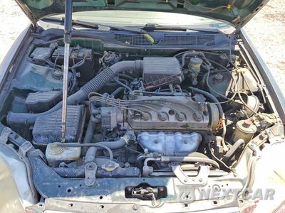 Zdjęcie 11 z 12 samochodu: 2000 HONDA CIVIC LX VIN:JHMEJ6670YS011458 - miniatura