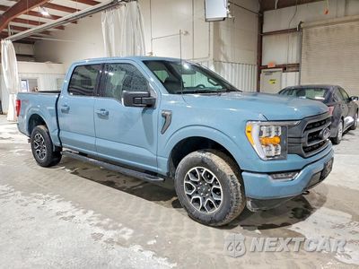 Czwarte zdjęcie samochodu z boku: 2023 FORD F150 SUPERCREW VIN:1FTEW1EP4PKF23438 - miniatura